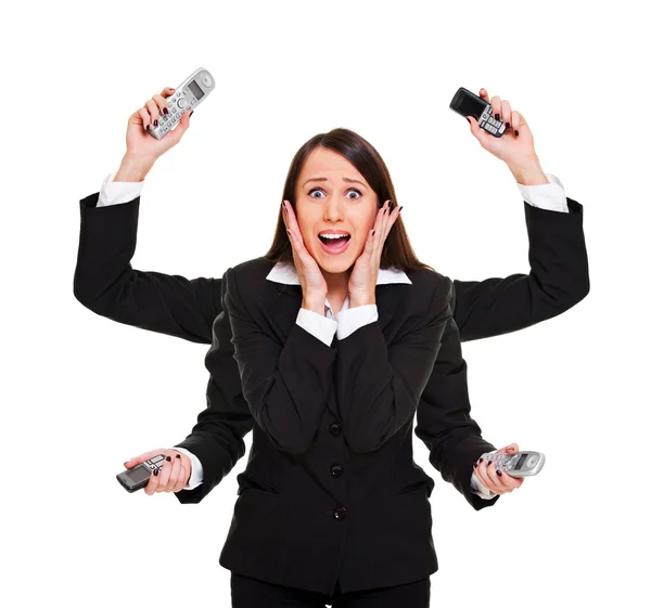 Stressed woman with telephones — Stock Photo, Image