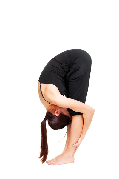 Kvinnan gör stretch övningar — Stockfoto