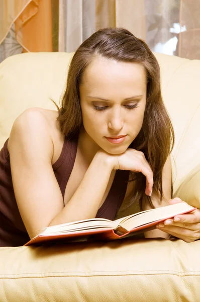 Woman reading novel at haome — Stock Photo, Image