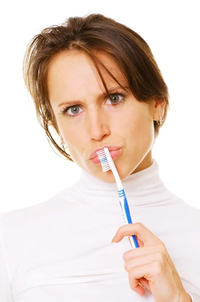 Woman with toothbrush thinking — Stok fotoğraf