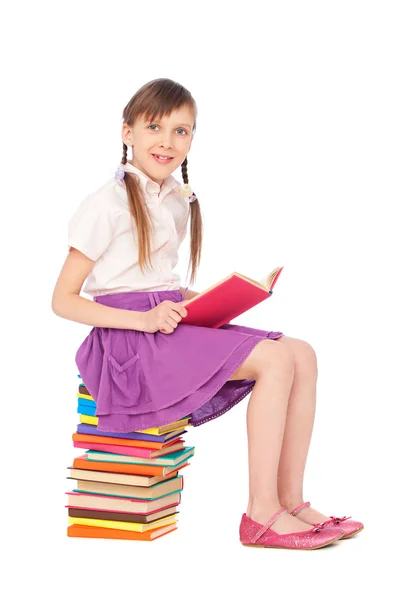 Söt flicka med böcker — Stockfoto