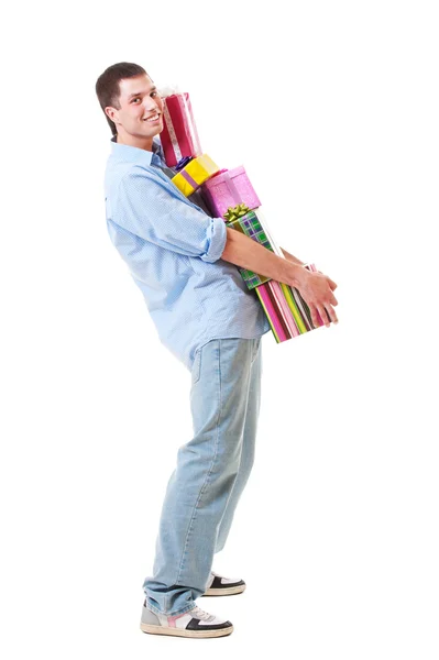 Happy guy with gift boxes — Stock Photo, Image