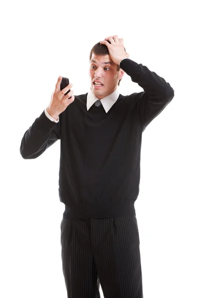 Homem de negócios chocado olhando para o celular — Fotografia de Stock