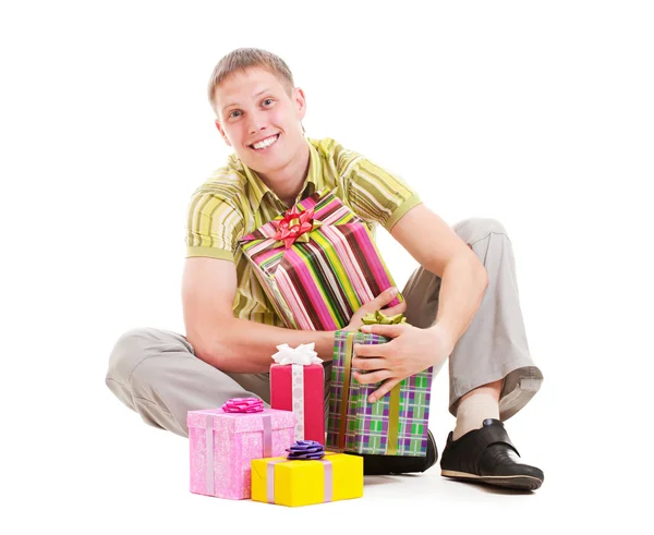 Homem feliz com muitas caixas de presente — Fotografia de Stock