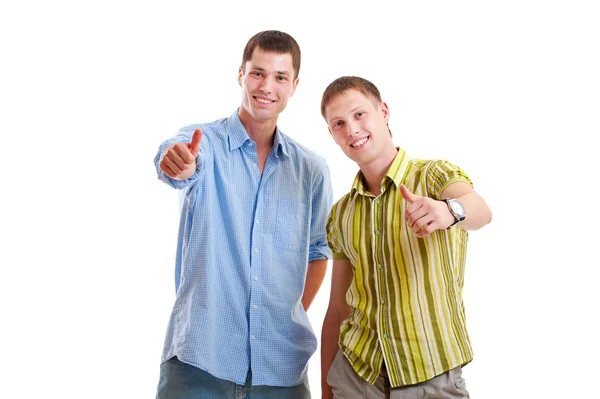 Homens sorridentes mostrando polegares para cima — Fotografia de Stock