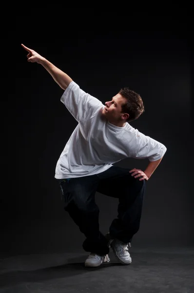 무언가 가리키는 breakdancer — 스톡 사진