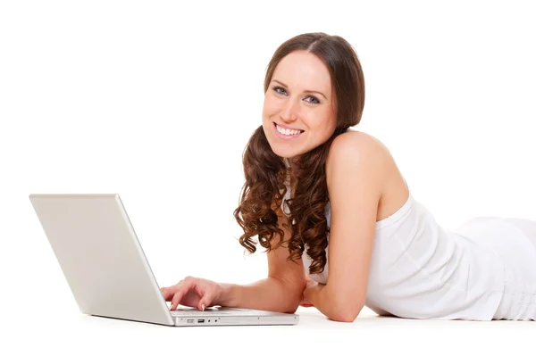 Smiley-Frau mit Laptop Stockbild