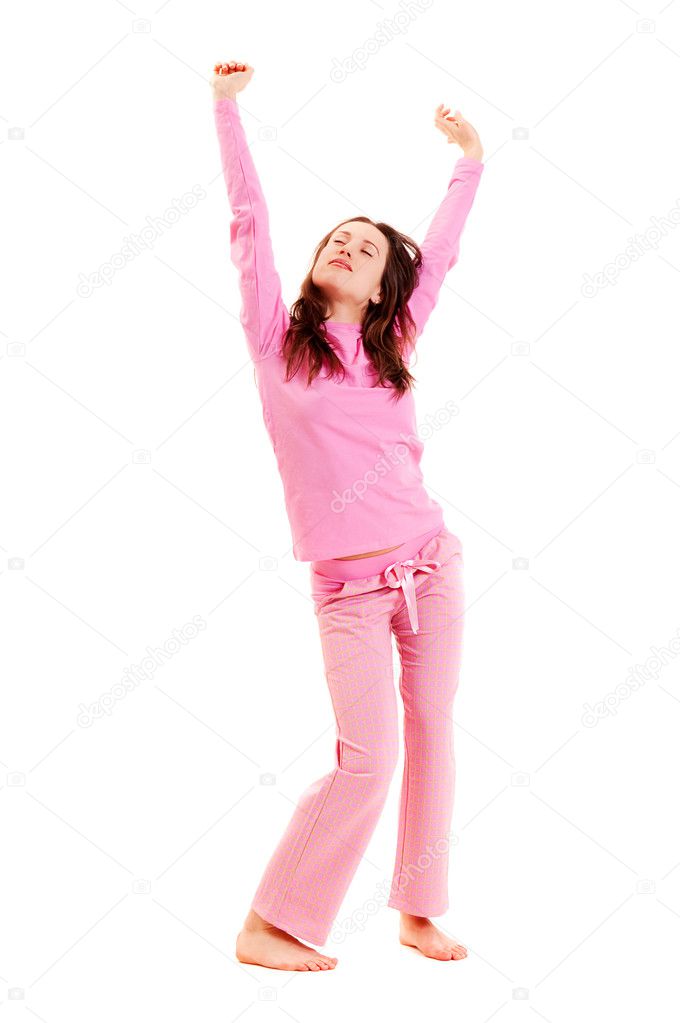 Young woman in pink pajamas