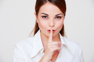 Woman making silence sign clipart