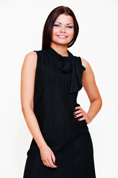 Mooie smiley vrouw in zwarte jurk — Stockfoto