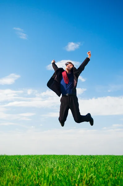 Gelukkige zakenman in stap-springen — Stockfoto