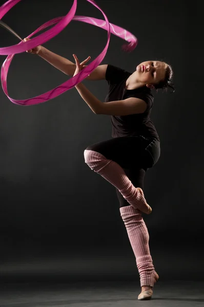 Attractive woman dancing with ribbon — Stock Photo, Image