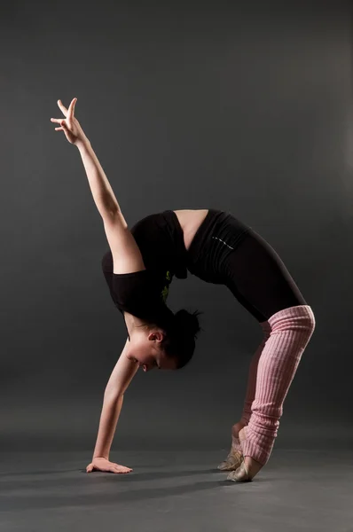 Beautiful flexible gymnast — Stock Photo, Image