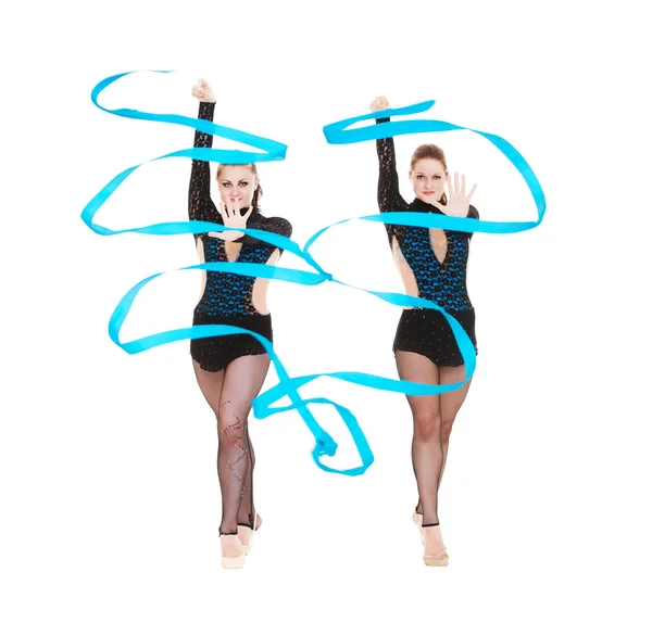 Two gymnasts dancing with blue ribbons — Stock Photo, Image