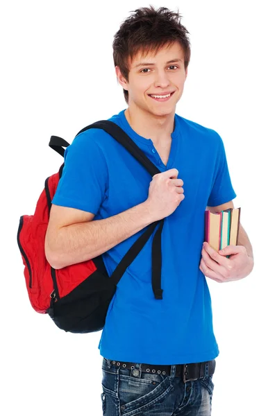 Student holding bag and books — Stock Photo, Image