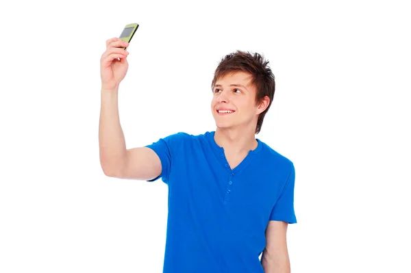 Jonge man nemen foto op telefoon — Stockfoto