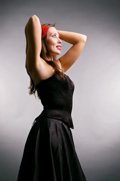 Mulher feliz em vestido preto — Fotografia de Stock