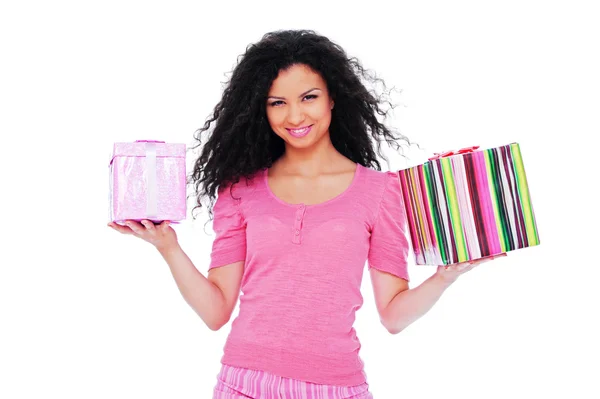 Happy woman holding gifts — Stock Photo, Image