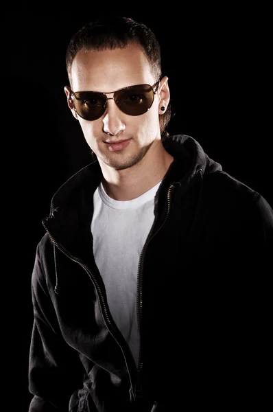 Handsome man in jacket and sunglasses — Stock Photo, Image