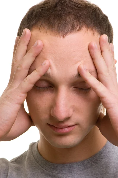 Ung man med huvudvärk — Stockfoto