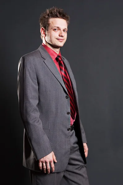 Successful businessman in grey suit — Stock Photo, Image