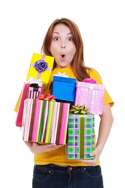 Verbaasd meisje met geschenkdozen — Stockfoto