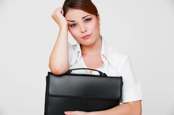 Bored secretary with black briefcase — Stock Photo, Image