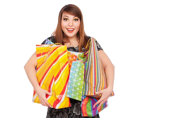Zabawna dziewczyna z torby na zakupy — Zdjęcie stockowe