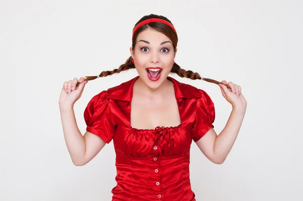 Funny happy girl with two pigtails — Stock Photo, Image