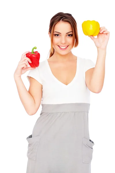 Happy woman with paprikas — Stock Photo, Image