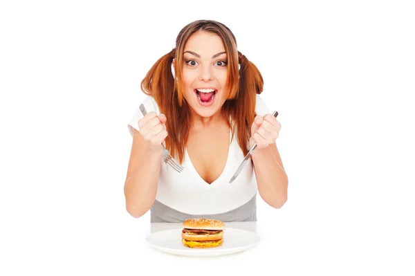Mulher com fome com hambúrguer — Fotografia de Stock