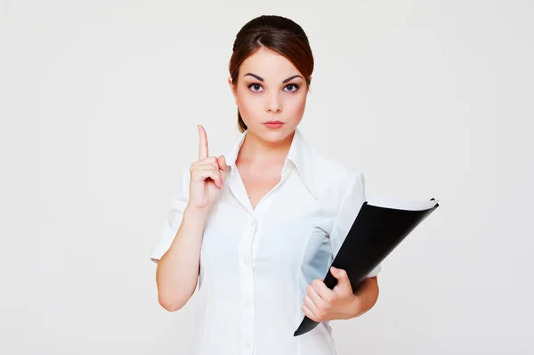 Serious businesswoman with her finger up — Stock Photo, Image