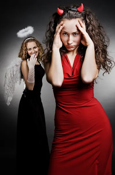 Ангел и дьявол — стоковое фото