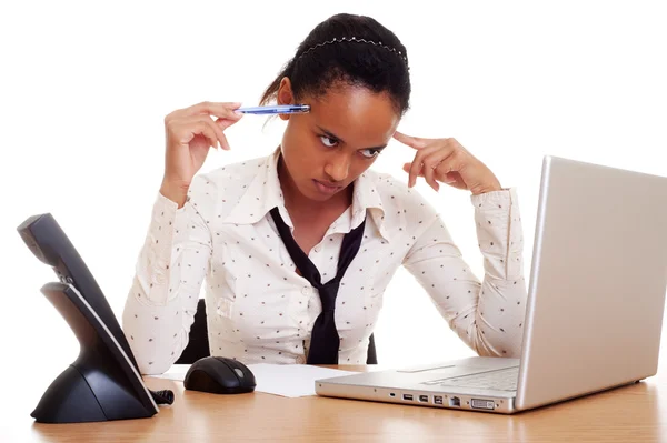 Serious student sitting on her workplace — Stock Photo, Image