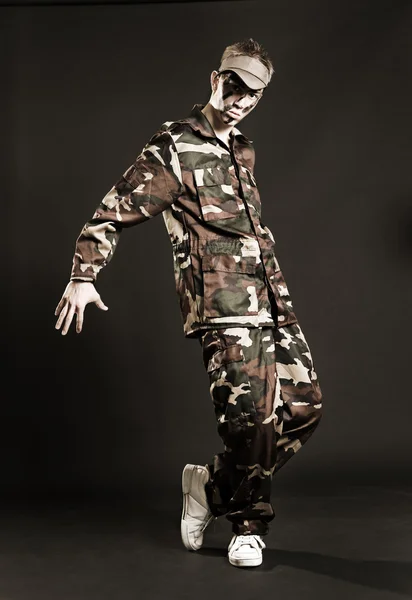 Breakdancer in camouflage dancing — Stock Photo, Image