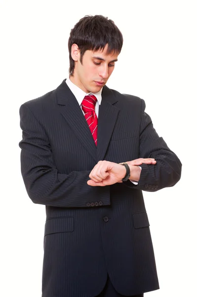 Biznesmen, patrząc na zegarek — Zdjęcie stockowe