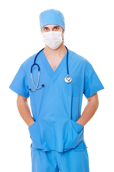 Médico con máscara y uniforme azul — Foto de Stock