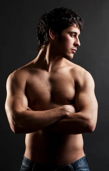 Handsome thoughtful man with naked torso — Stock Photo, Image