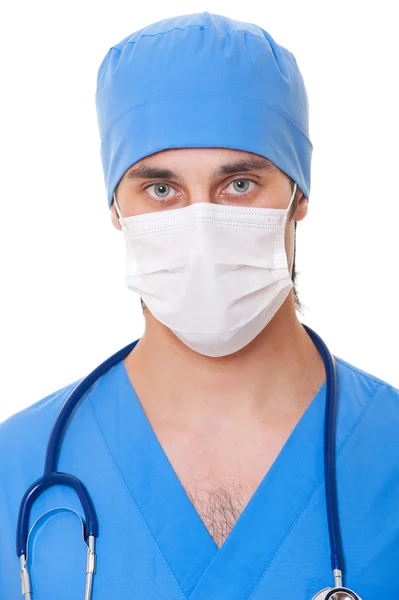 Portret van dokter in masker en blauw uniform — Stockfoto