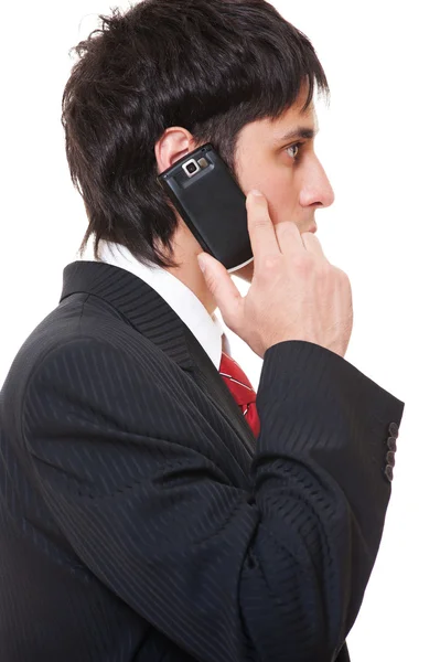 Hombre de negocios serio con teléfono celular — Foto de Stock