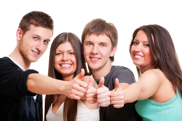 Cheerful company showing thumbs up Royalty Free Stock Photos