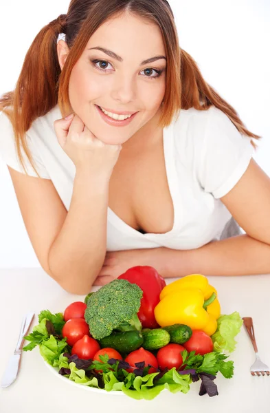 Happy woman with vegetables Stock Picture