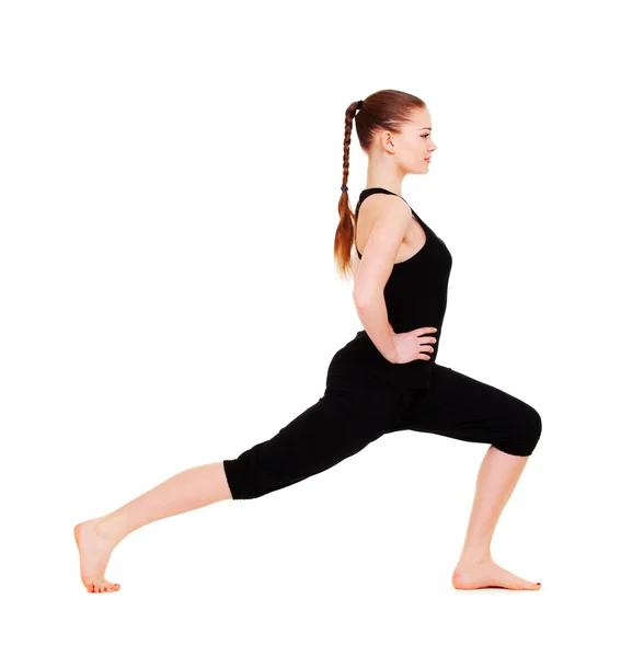 Smiley vrouw doet flexibiliteit oefening — Stockfoto