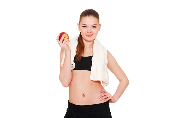 Αθλητική γυναίκα με μήλο και πετσέτα — Φωτογραφία Αρχείου