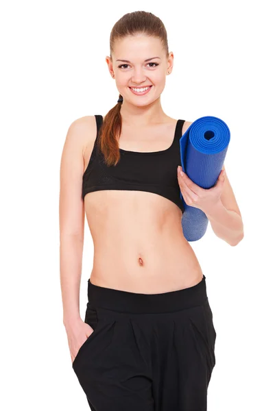 Young woman with blue mat — Stock Photo, Image