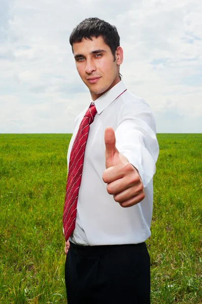Businessman showing thumbs up — Stock Photo, Image