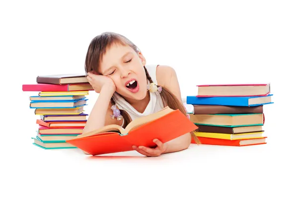 Menina sonolenta com livros — Fotografia de Stock