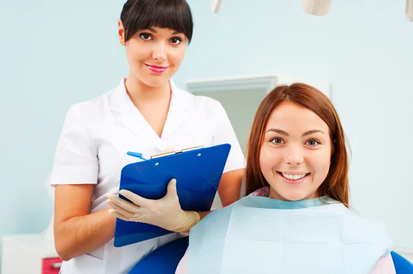 Friendly doctor with patient — Stock Photo, Image