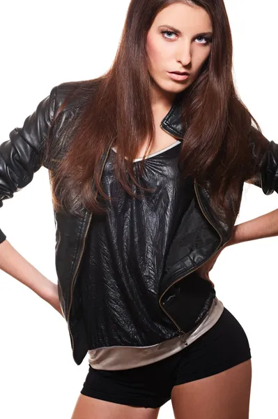 Sexy woman in leather coat and shorts — Stock Photo, Image