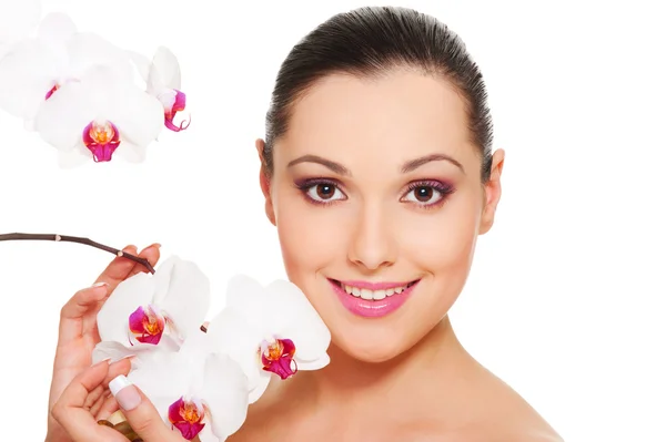 Woman with orchid — Stock Photo, Image